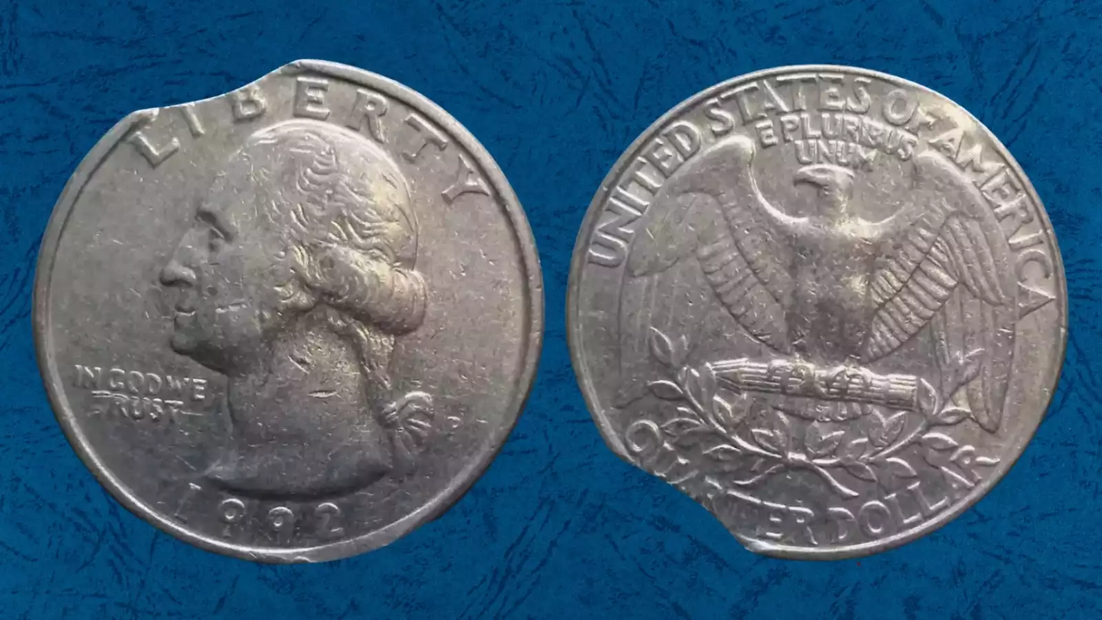 1992 quarter clipped planchet error showing curved clip at coin edge with Blakesley effect opposite